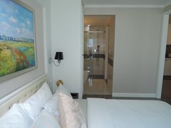 The Orient Resort and Spa Jomtien showing the bedroom suite
