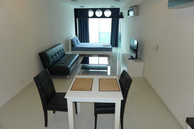 Condominium For Sale Pratumnak showing the dining and living areas Condominium For Sale Pratumnak showing the dining and living areas