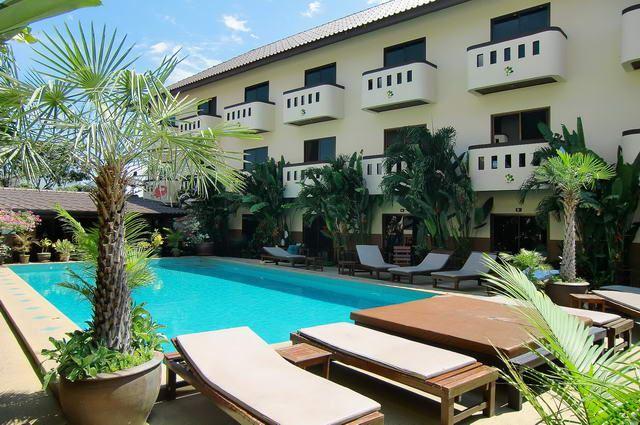 Serviced Apartments For Sale Pattaya showing the building and pool