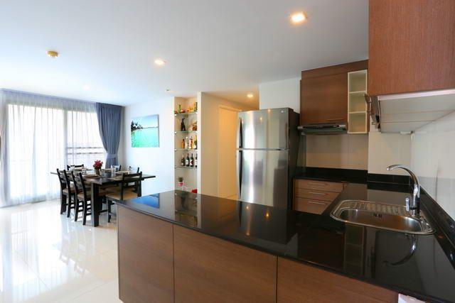 Condominium For Sale Pattaya showing the kitchen and dining areas Condominium For Sale Pattaya showing the kitchen and dining areas