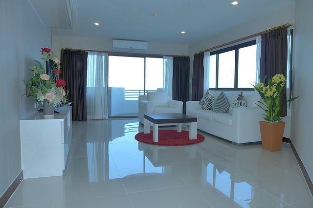 Condominium for sale at Ban Amphur Pattaya showing the living area and balcony Condominium for sale at Ban Amphur Pattaya showing the living area and balcony