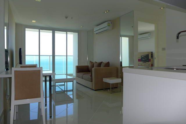 Condominium For Sale Pratumnak showing the living and dining areas Condominium For Sale Pratumnak showing the living and dining areas