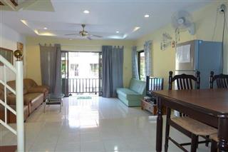 Pool resort and villa business for sale Pratumnak Pattaya showing the living and dining areas