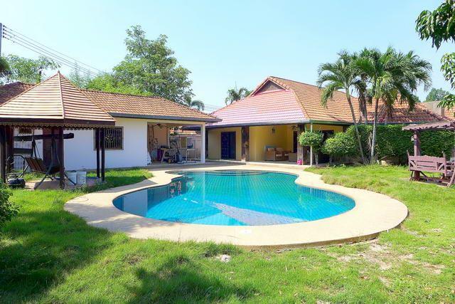 House for sale Pattaya showing the private swimming pool and Sala House for sale Pattaya showing the private swimming pool and Sala