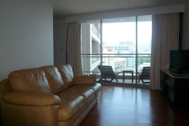 Condominium for sale in Pattaya showing sitting near to the balcony Condominium for sale in Pattaya showing sitting near to the balcony