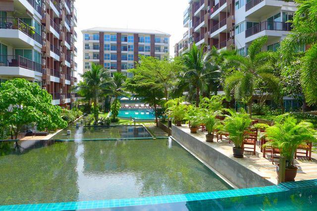 Condominium For Sale Pratumnak showing the communal pool and buildings Condominium For Sale Pratumnak showing the communal pool and buildings