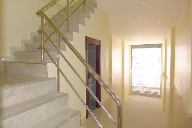 Shop house for sale pattaya showing the stairs and toilet Shop house for sale pattaya showing the stairs and toilet