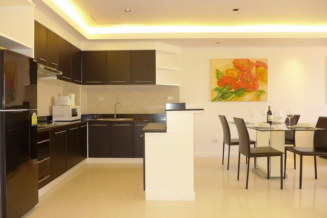 Condominium for sale Pattaya showing the kitchen and dining areas Condominium for sale Pattaya showing the kitchen and dining areas