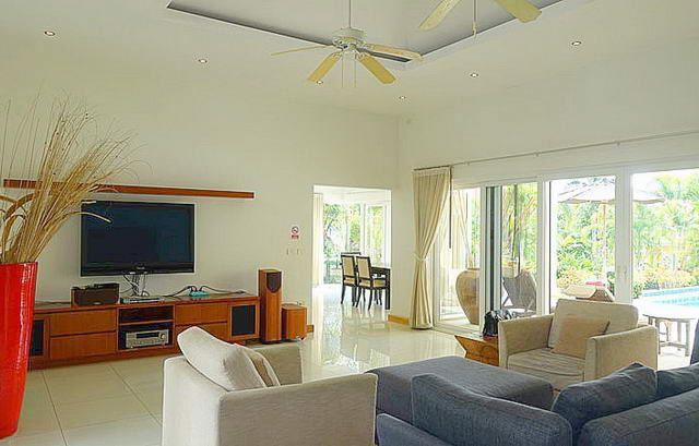 House for sale Siam Royal View Pattaya showing the living area poolside House for sale Siam Royal View Pattaya showing the living area poolside