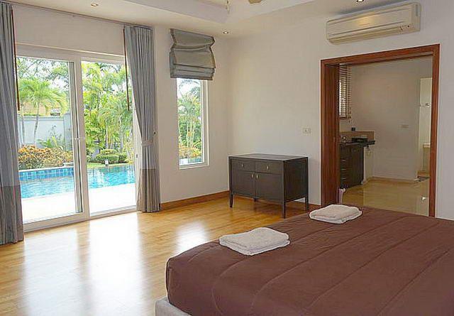 House for sale Siam Royal View Pattaya showing the master bedroom poolside House for sale Siam Royal View Pattaya showing the master bedroom poolside