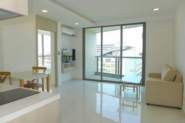 Condominium for sale Pratumnak Hill showing the living room and balcony Condominium for sale Pratumnak Hill showing the living room and balcony