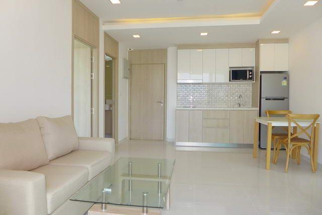 Condominium for sale Pratumnak Hill showing the living and dining areas Condominium for sale Pratumnak Hill showing the living and dining areas