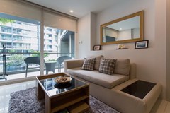 Condominium for rent Pattaya showing the living area and balcony 