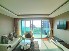 Condominium for rent Pratumnak Pattaya showing the living room and balcony 