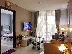 Condominium for sale Pratumnak Hill Pattaya showing the living room looking to bedroom 