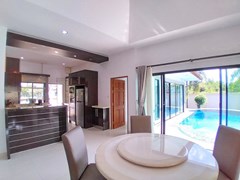 House for sale Pattaya showing the dining and kitchen areas 