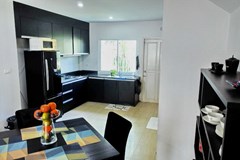 House for sale Jomtien showing the dining and kitchen areas 