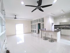 House for sale Mabprachan Pattaya showing the dining and kitchen areas concept 