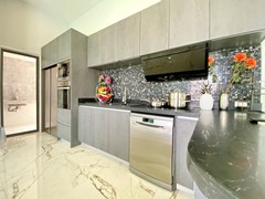 House for sale Mabprachan Pattaya showing the kitchen area 