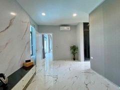 House for sale Mabprachan Pattaya showing the master bedroom 