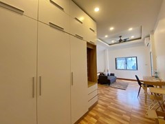 House for sale Mabprachan Pattaya showing the master bedroom and wardrobes 