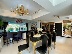House for sale Pattaya showing the dining area and guest bathroom