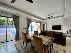 House for sale Pattaya showing the dining and living areas  