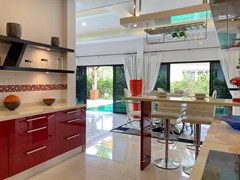 House for Sale Pattaya showing the kitchen and dining areas 