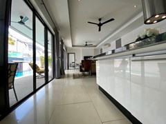 House for sale Pattaya showing the kitchen and cabinet 