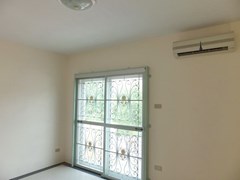 House for sale Pattaya showing the second bedroom and balcony