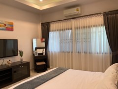 House for Sale Pattaya showing the second bedroom with furniture 