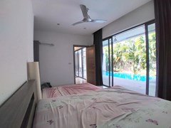 House for sale Mabprachan Pattaya showing the master bedroom pool view 