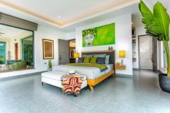 The Plantation Estates Pattaya for sale showing the master bedroom suite