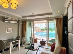 Condominium for rent Pattaya showing the living, dining and balcony 