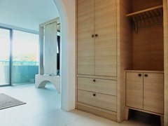 Condominium for sale Bangsaray Pattaya showing the built-in wardrobes 