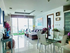 Condominium for sale Na Jomtien showing the living, dining areas and balcony