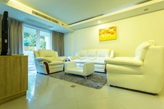 Condominium for sale Pattaya showing the living area and balcony 