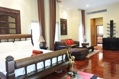 House for sale Na Jomtien showing the master bedroom suite 