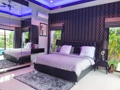 House for Sale Pattaya showing the master bedroom 