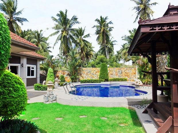 House For Sale Nongpalai Pattaya showing the garden, pool and guest house House For Sale Nongpalai Pattaya showing the garden, pool and guest house