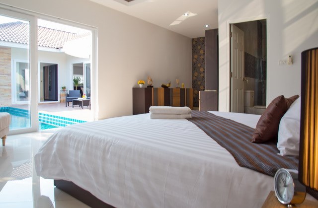 House For Sale Huay Yai showing the master bedroom poolside House For Sale Huay Yai showing the master bedroom poolside