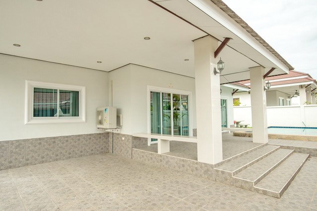 House for sale Bangsaray Pattaya showing the house and carport House for sale Bangsaray Pattaya showing the house and carport
