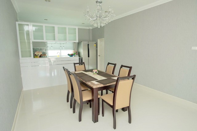 House for sale Bangsaray Pattaya showing the dining and kitchen House for sale Bangsaray Pattaya showing the dining and kitchen