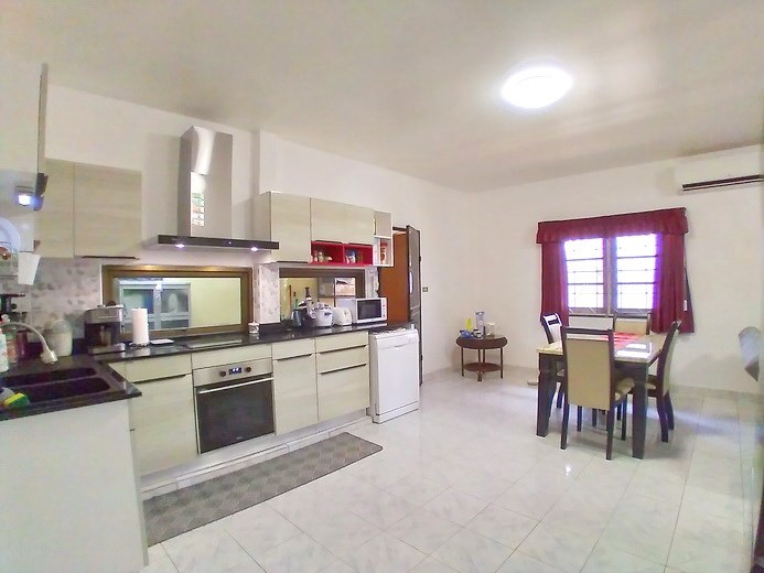 House for sale East Pattaya showing the kitchen and dining areas House for sale East Pattaya showing the kitchen and dining areas
