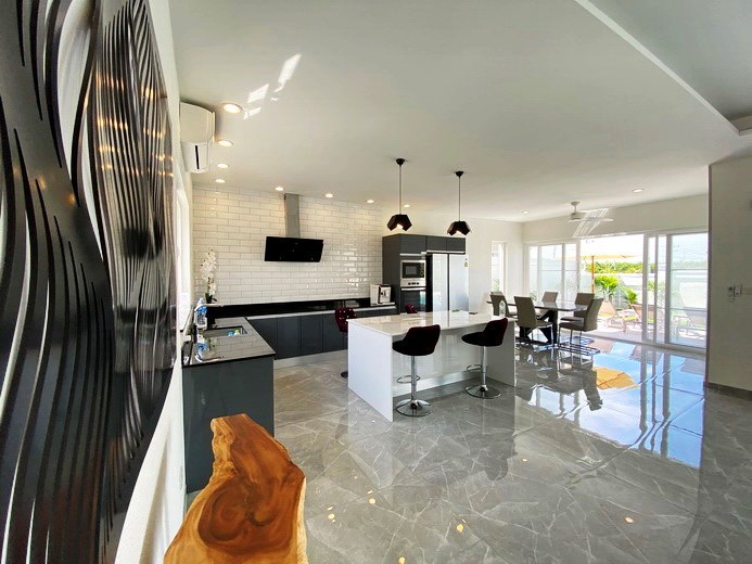 House for sale East Pattaya showing the large kitchen and dining areas 