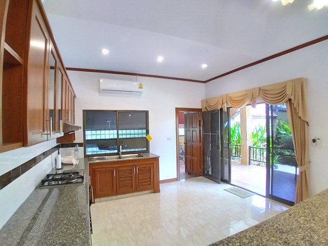 House for sale East Pattaya showing the kitchen and covered terrace House for sale East Pattaya showing the kitchen and covered terrace