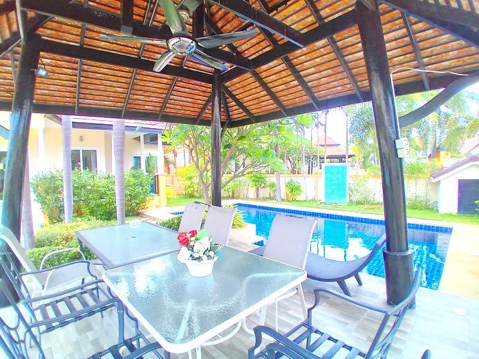 House for sale Pattaya showing the sala and pool House for sale Pattaya showing the sala and pool