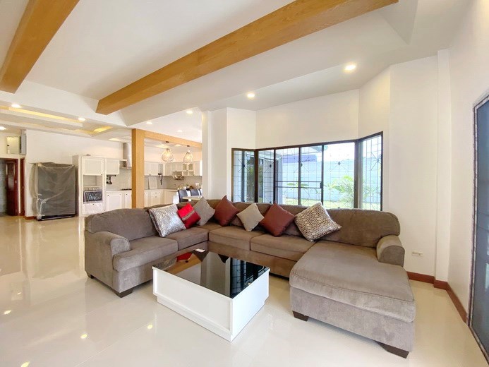 House for sale Mabprachan Pattaya showing the living, dining and kitchen areas  