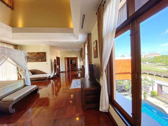 House for sale Na Jomtien showing the master bedroom and views 