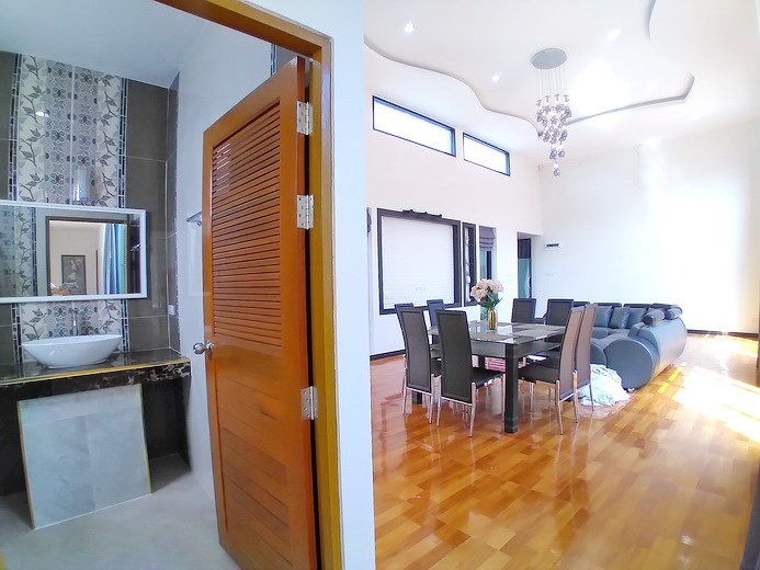 House for sale Pattaya Bangsaray showing the living, dining areas and guest bathroom House for sale Pattaya Bangsaray showing the living, dining areas and guest bathroom